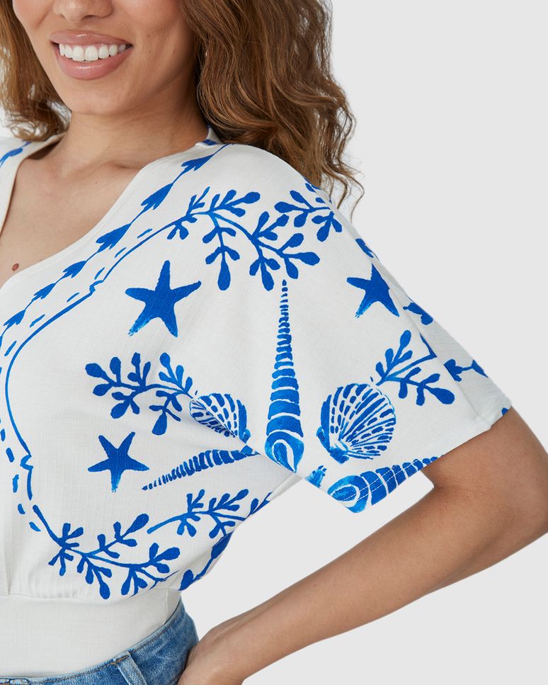 Blusa Ampla Feminina Estampada Decote V Em Malha Canelada